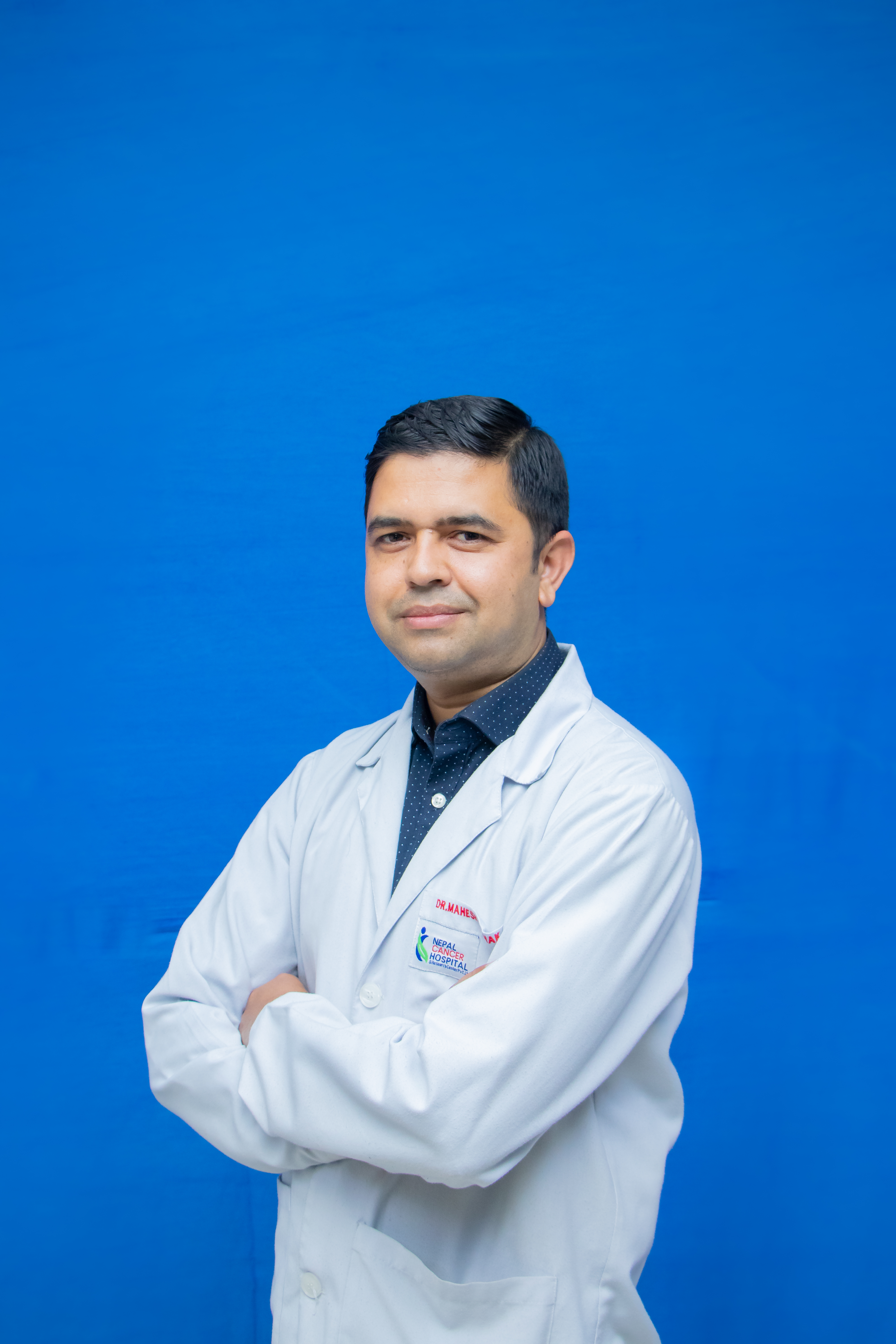 Dr. Mahesh Pathak